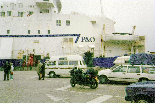 [Photo of the bike and a ferry]