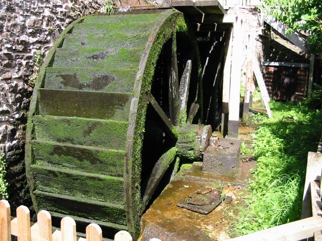 [Photo of the mill wheels at Dunster Mill]
