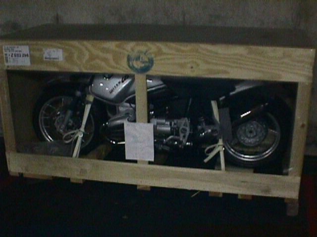 [Photo of bike in crate]